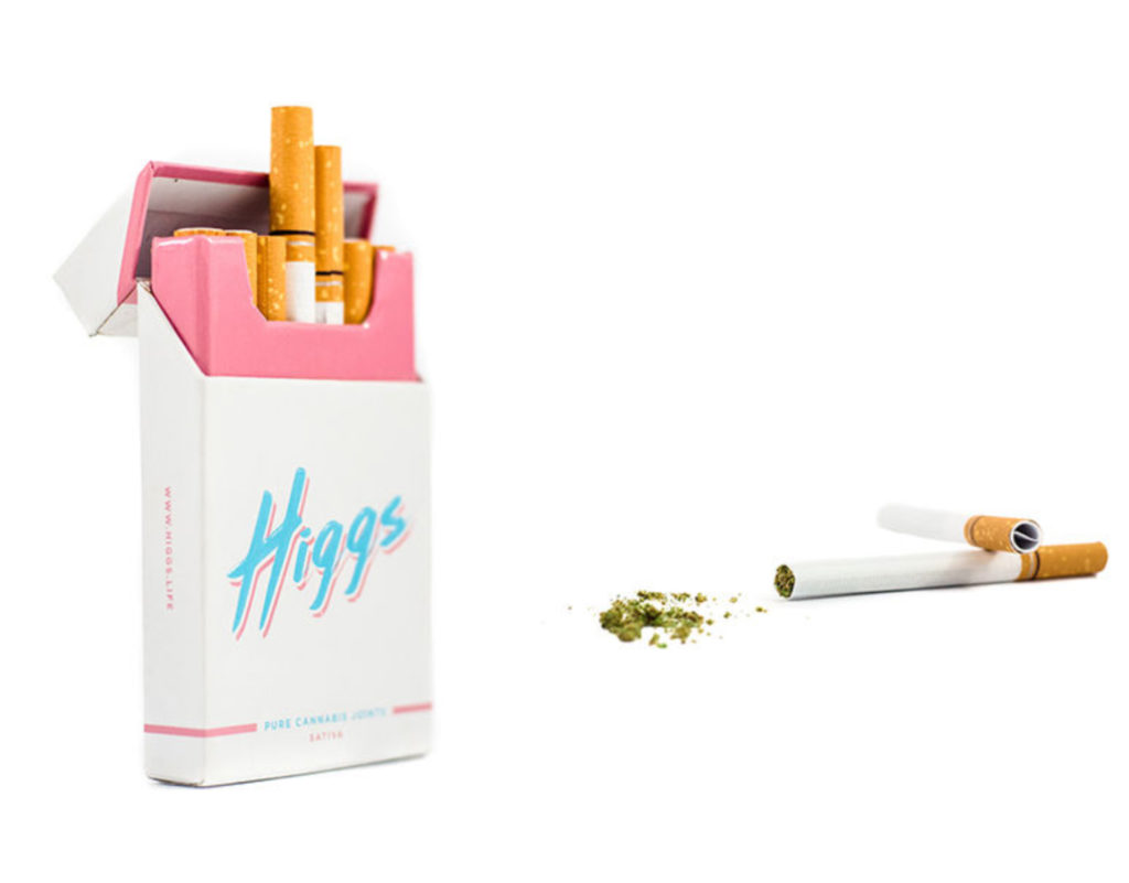 A custom cigarette-style box with pre-rolls sticking out. The pre-rolls are designed to look just like cigarettes